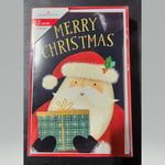 American Greetings Folk Santa Holding Gift