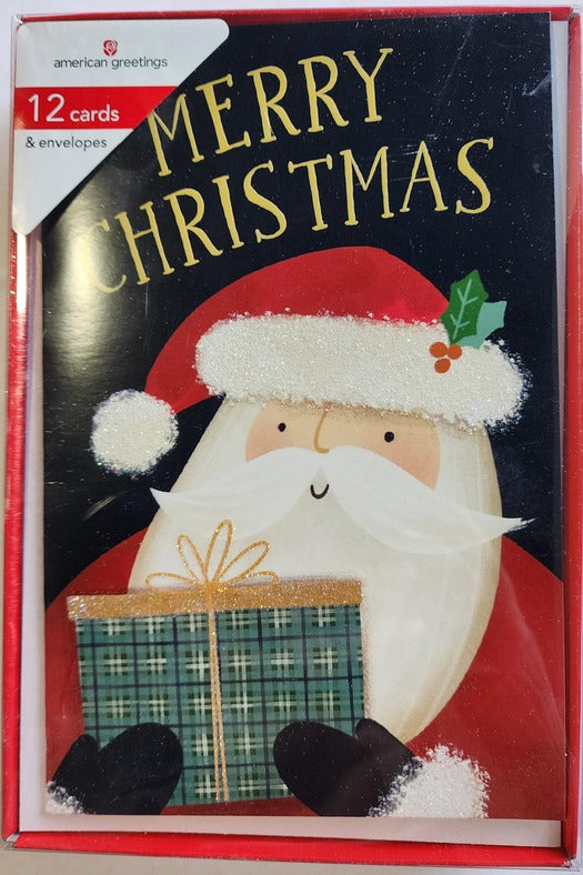 American Greetings Folk Santa Holding Gift